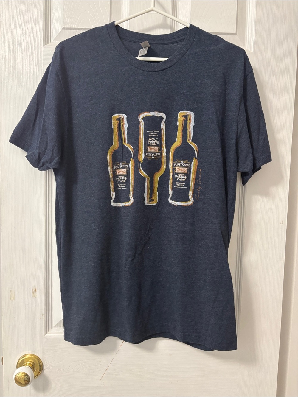 Next Level Apparel Navy Short-Sleeve Tee with Bottle Graphic